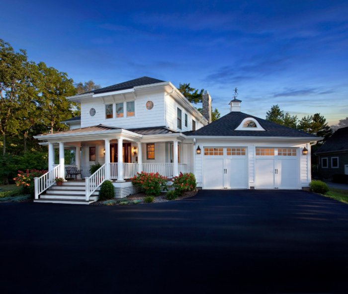 Carriage house garage doors are growing in popularity with homeowners. (Photo courtesy of Clopay)